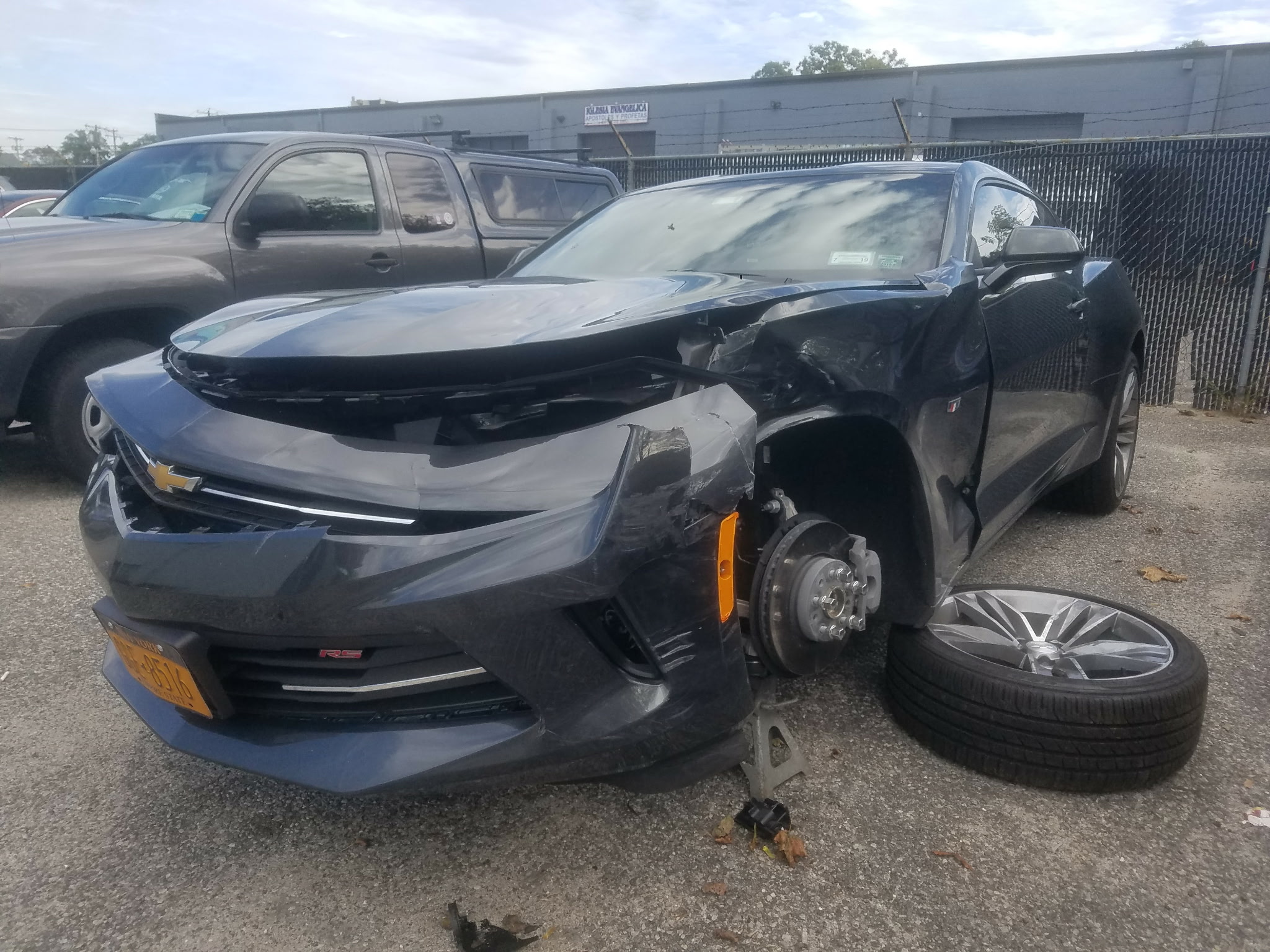 Damaged Camaro before repair